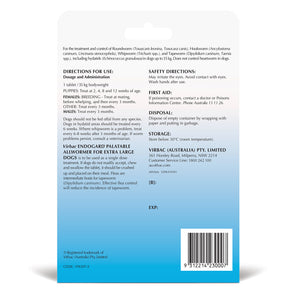 Back of a blue medication package with text and a barcode on a white background at Pet Servo