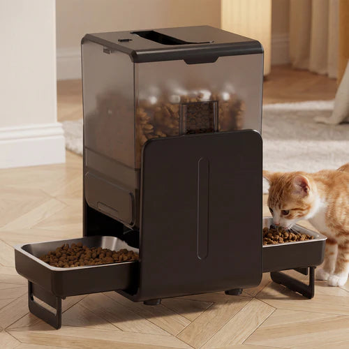 Pet food dispenser with two bowls of food on a wooden floor, with a cat eating from one of the bowls at Pet Servo
