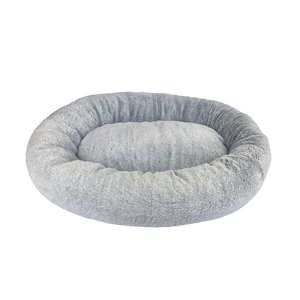 Gray donut-shaped pet bed on a white background at Pet Servo