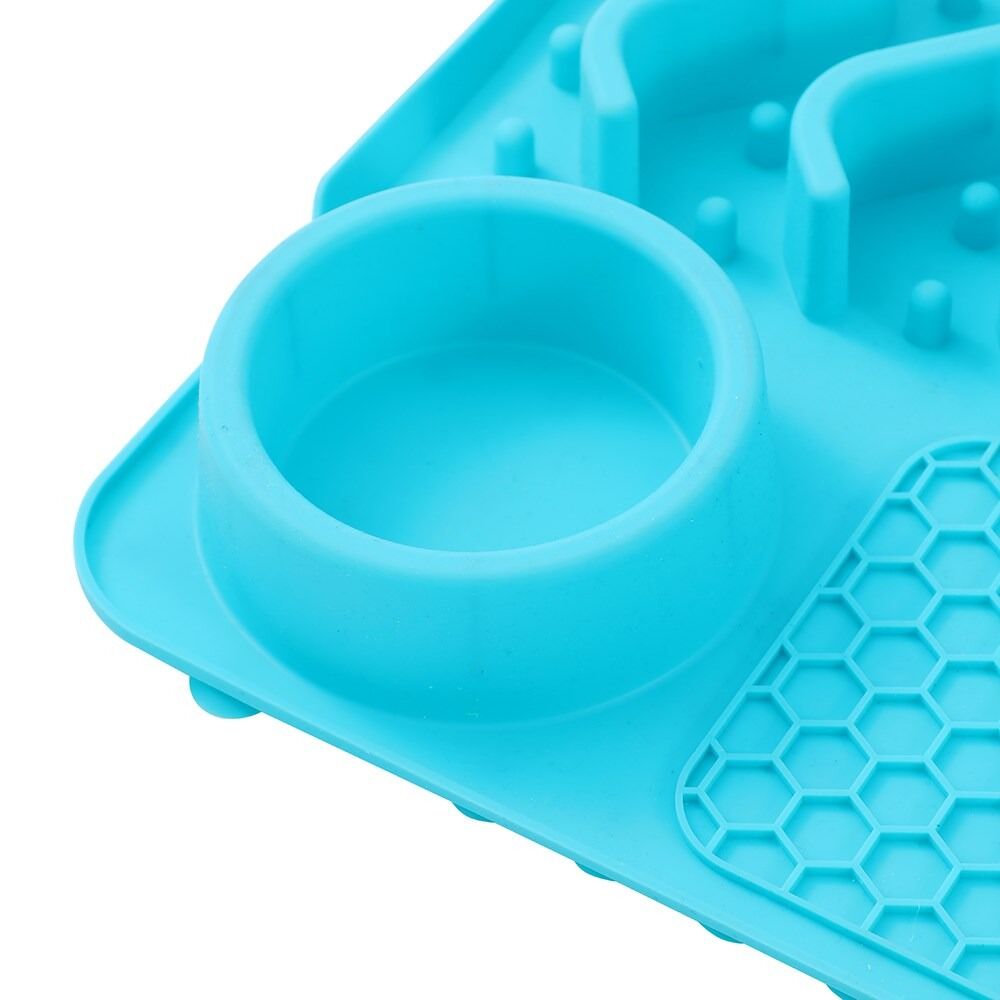 Blue silicone mold with multiple compartments on a white background at Pet Servo