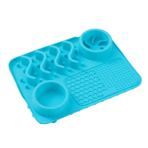 Blue silicone mold with multiple cavity design on a white background at Pet Servo