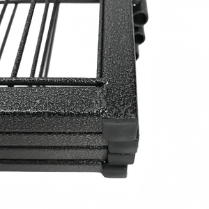 Close-up of a black metal grill on a white background at Pet Servo