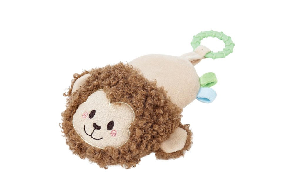 A plush lion baby toy with curly brown faux fur, a cream-colored face and belly, a light green teething ring, and small blue and green fabric accents, shown on a plain white background at Pet Servo