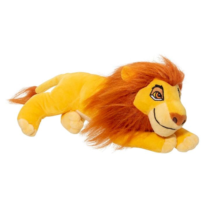 Plush toy of a lion lying down on a white background