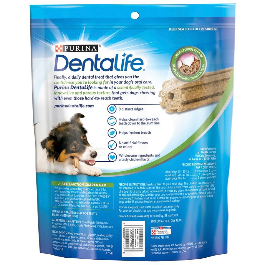 Purina Dentalife dog treat package with a dog holding a treat on a blue background