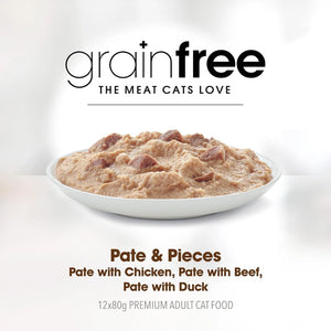 Cat food pate with pieces in a bowl on a white background, featuring 'grainfree' branding.