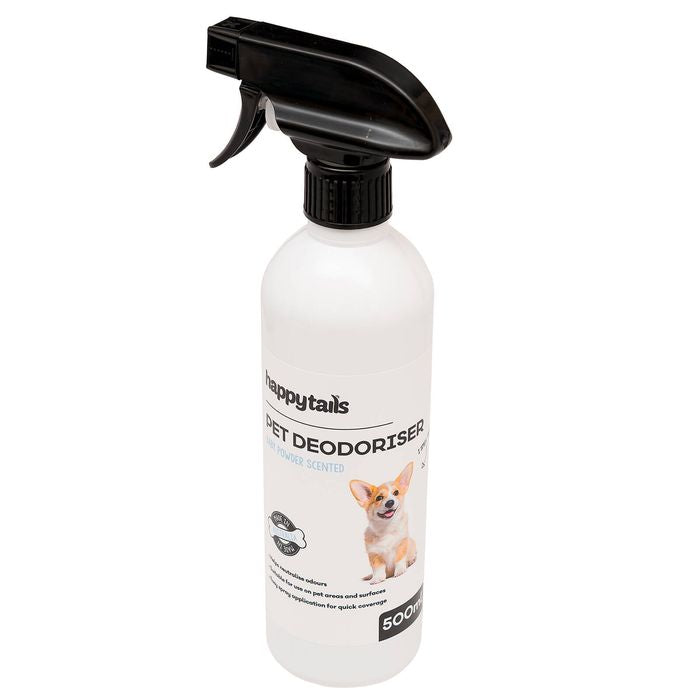 A 500ml spray bottle of Happytails Pet Deodorised Air Freshener with a black trigger sprayer and a white bottle body, featuring a label with a chihuahua dog illustration.