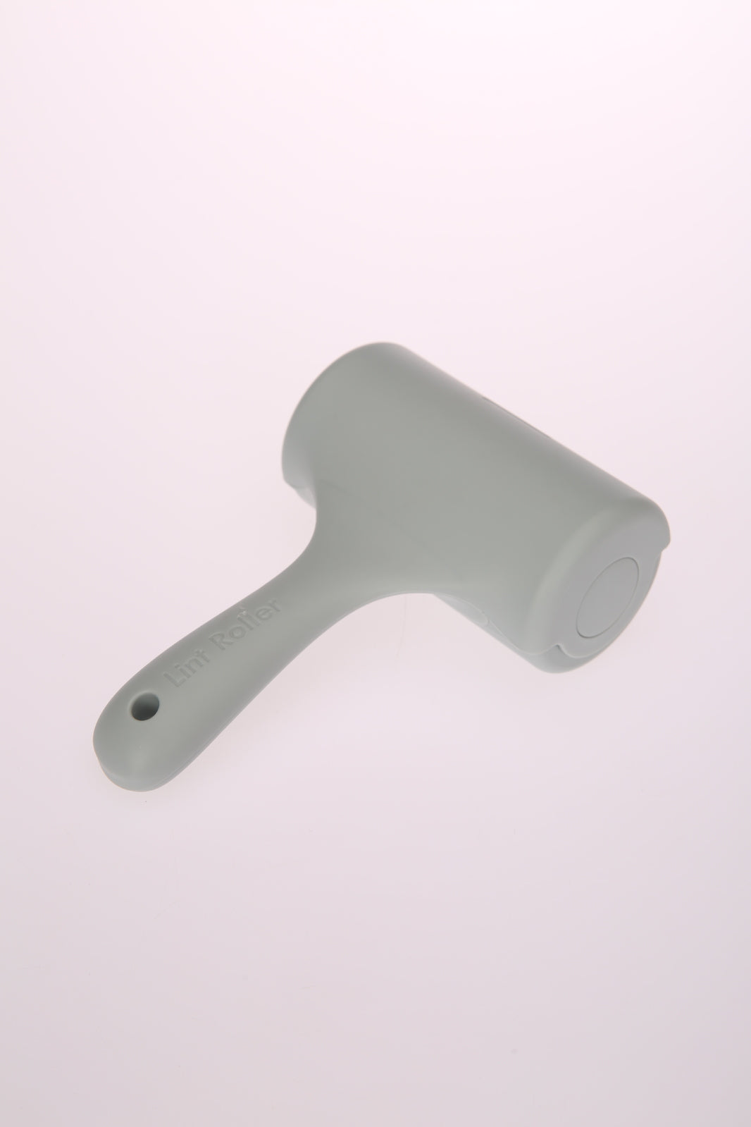 Light gray cleaning brush on a white background at Pet Servo