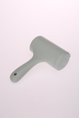 Light gray cleaning brush on a white background at Pet Servo