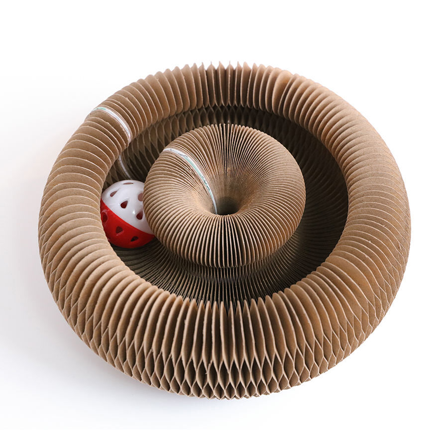 Cardboard tube with a red and white object inside on a white background at Pet Servo