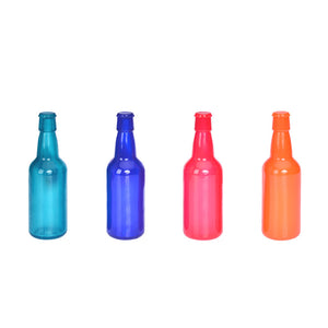 Four colorful bottles of different sizes on a white background at Pet Servo