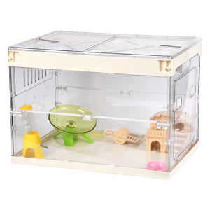 Clear hamster cage with various accessories on a white background