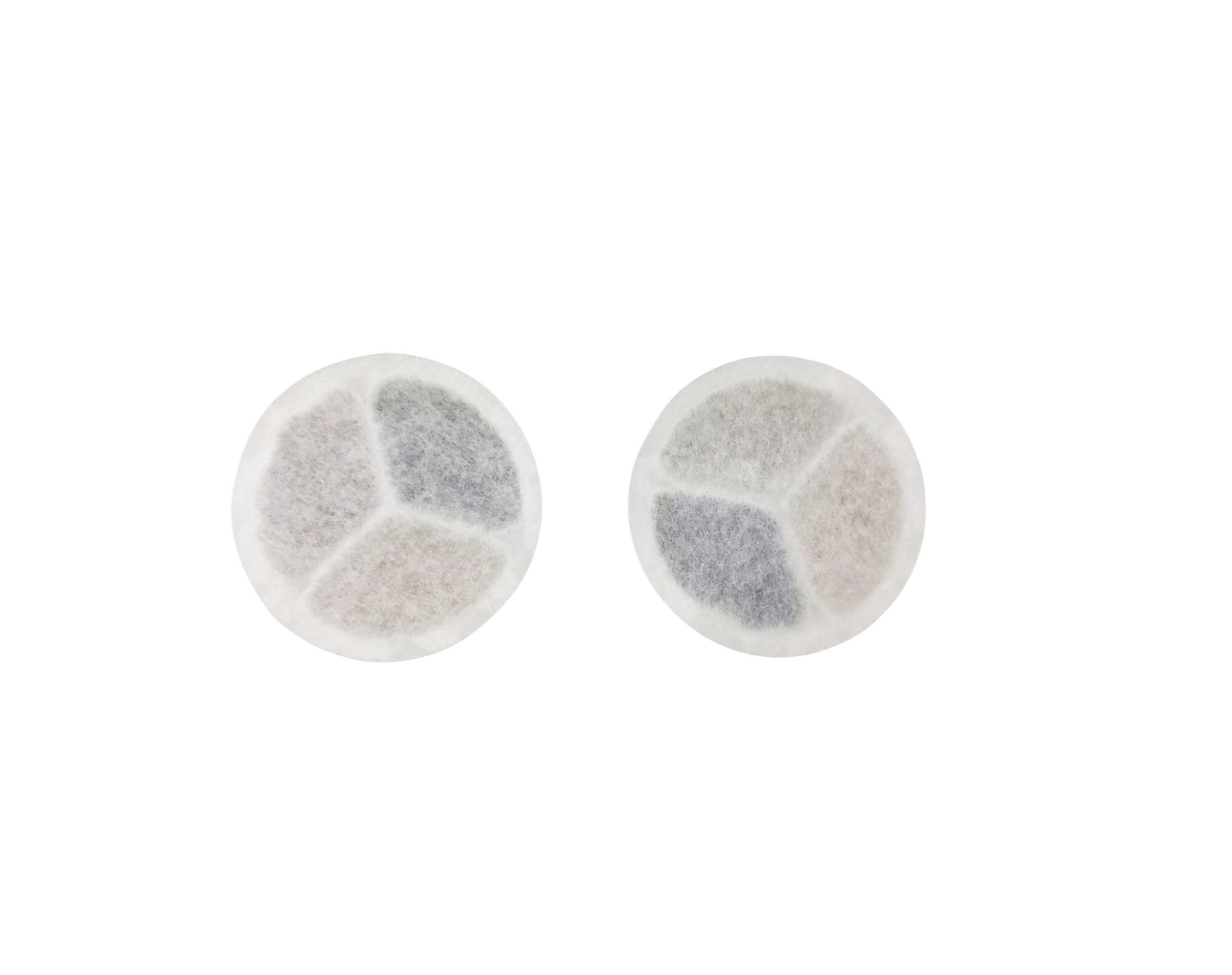Two round white filters with gray centers on a white background at Pet Servo