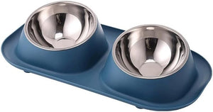 A two-bowl pet feeder and waterer tray with a matte blue base and stainless steel bowls, shown on a plain white background at Pet Servo