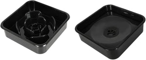 Two black slow feeder bowls shown side by side on a plain white background, one displaying the rose-shaped internal channel and the other showing the bottom drain with a paw print cutout at Pet Servo