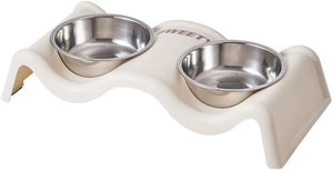 A cream-colored double pet feeder and waterer with two stainless steel bowls, shown on a plain white background at Pet Servo