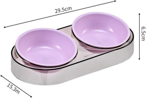 A double bowl pet feeder or water bowl with two light purple bowls set in a stainless-steel tray, shown with dimension lines and measurements: 29.5 cm length, 6 at Pet Servo