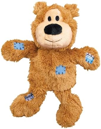 A brown plush teddy bear dog toy with blue stitched paw and knee patches, isolated on a white background at Pet Servo