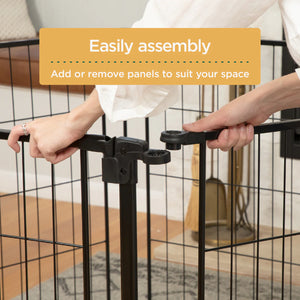 Person assembling a black metal gate with text overlay on a neutral background