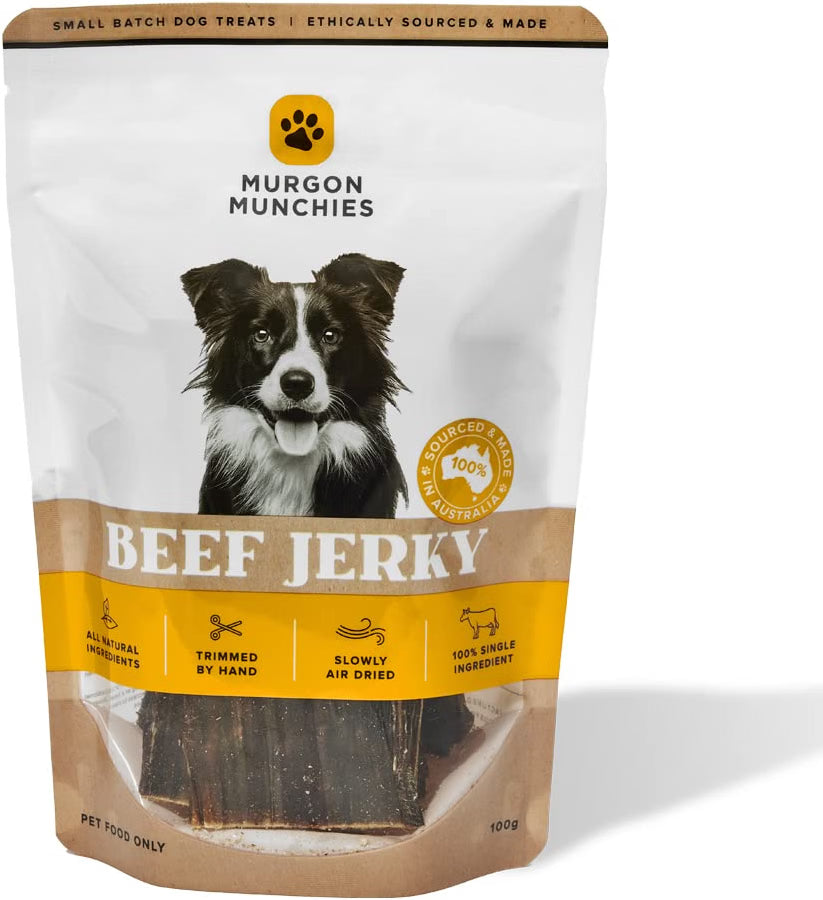 A stand-up pouch of Murgon Munchies Beef Jerky dog treats, featuring a black and white border collie on the front, set against a clean white background.