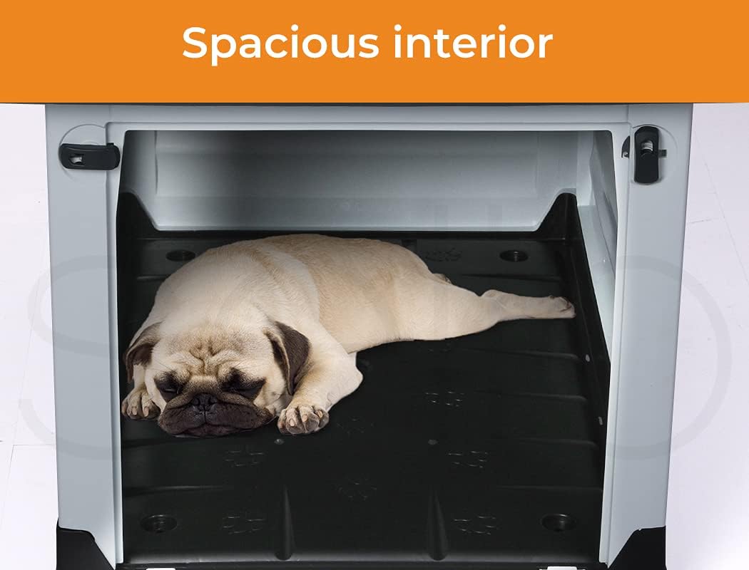 A light fawn pug lies stretched out inside a large white and black pet crate, with an orange banner at the top reading 'Spacious interior' at Pet Servo