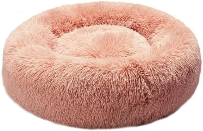 Fluffy pink pet bed on a white background at Pet Servo