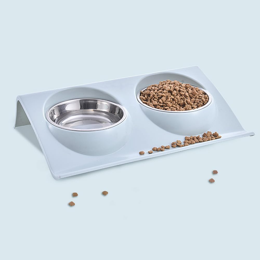 A white dual-bowl pet feeder and waterer stand with stainless steel bowls, shown on a light blue background with some kibble scattered around at Pet Servo