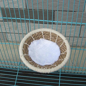 Small woven bowl with a white substance inside on a metal cage background at Pet Servo