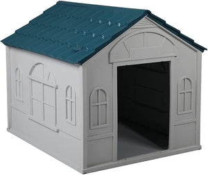 A small dog playhouse shaped like a white cottage with a dark teal roof, shown on a plain white background at Pet Servo