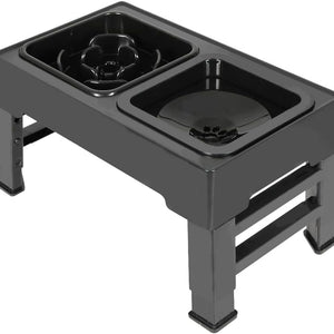 Black elevated pet feeder and waterer stand with two integrated bowls on a white background at Pet Servo