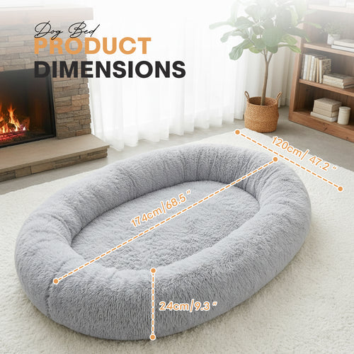 Gray dog bed with dimensions labeled in a home setting at Pet Servo