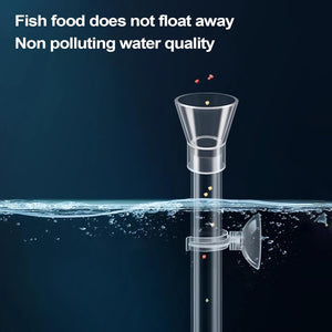 Aquarium feeder with fish food being dispensed into water, against a dark background at Pet Servo