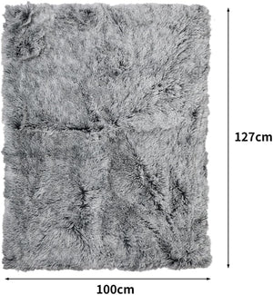 A gray shaggy faux-fur rug shown from above with dimension arrows and labels indicating 127 cm height and 100 cm width on a white background at Pet Servo