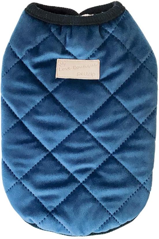 Blue quilted dog coat with a brand label on a white background at Pet Servo