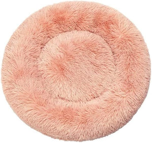 Round pink fluffy pet bed on a white background at Pet Servo