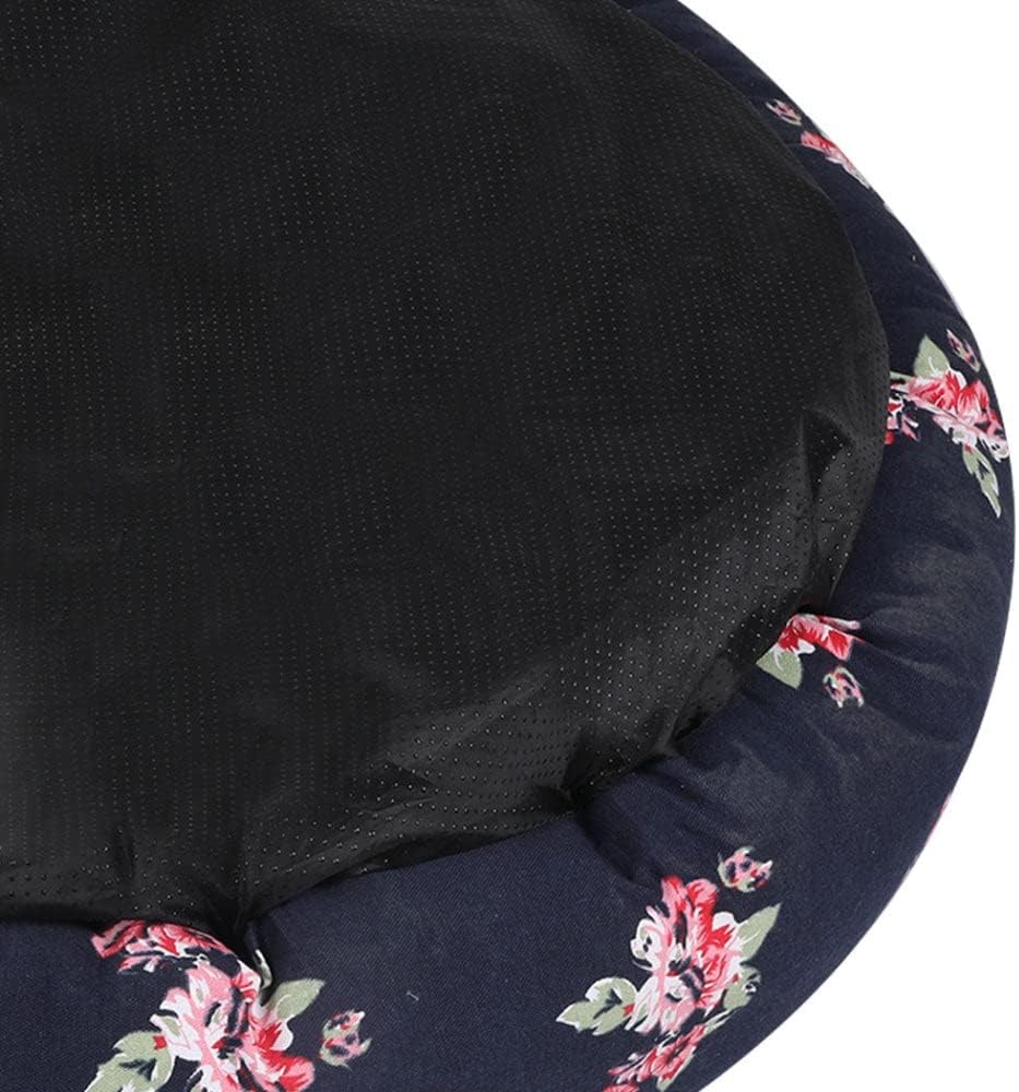 Close-up of a round pet bed showing a black textured mesh top and a navy blue fabric edge with a red and pink floral pattern on a white background at Pet Servo
