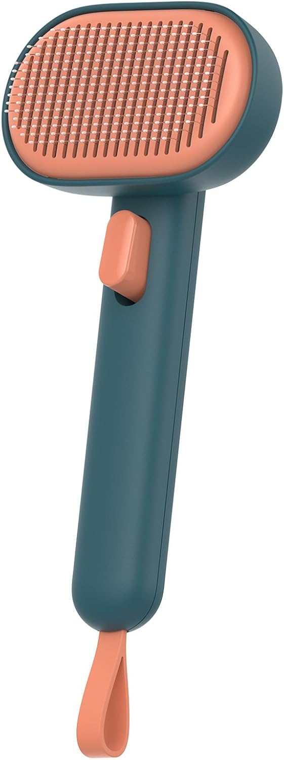 Pet grooming brush with green handle and pink bristle head on a white background at Pet Servo