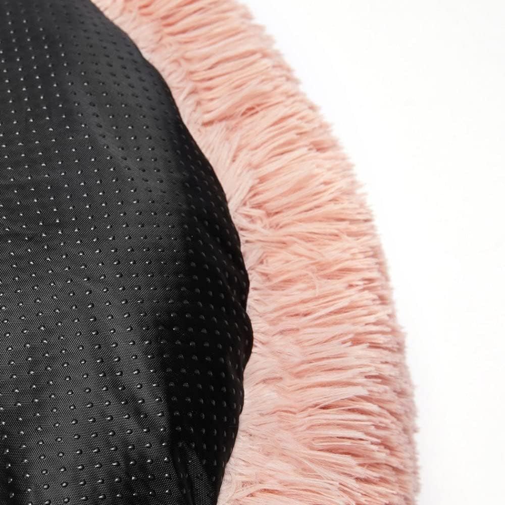 Close-up of a black textured sleeve with a pink fringed cuff on a white background at Pet Servo