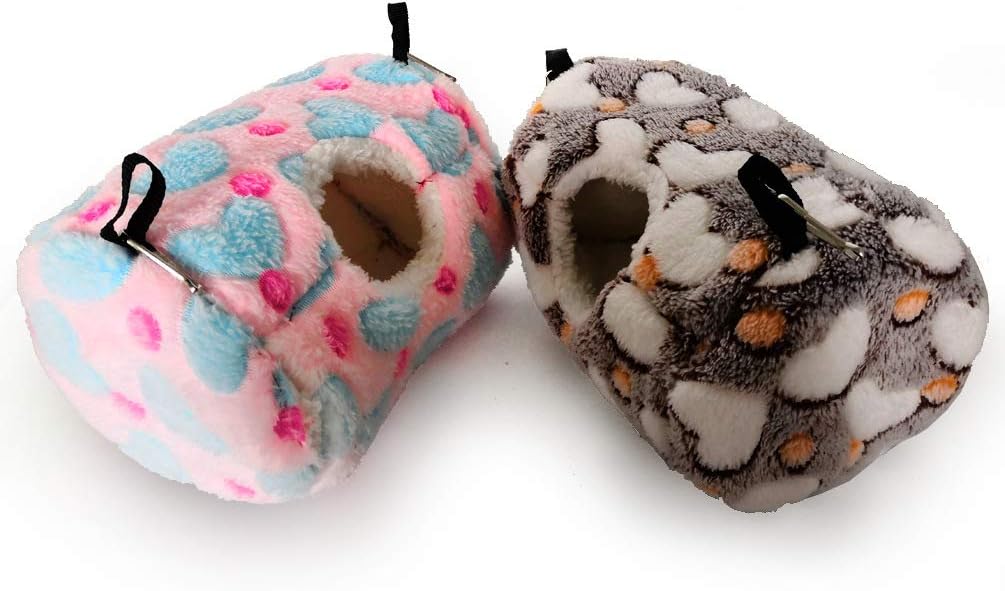 Two fleece-lined pet houses, one with a floral pattern and the other with a snowflake pattern, on a white background at Pet Servo