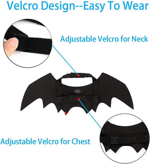 Black bat-wing shaped vest or costume accessory with text callouts explaining Velcro design for neck and chest, plus two circular inset close-ups showing the adjustable Velcro straps at Pet Servo