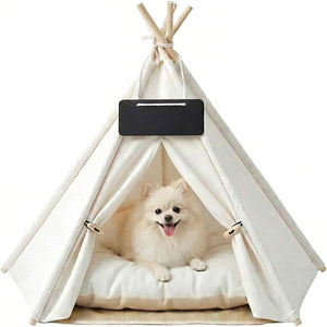 Dog inside a white pet teepee with a black rectangular object on top at Pet Servo