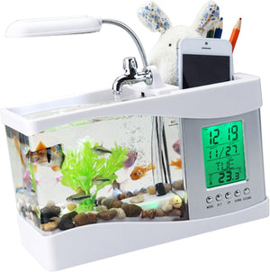 Small aquarium with fish, a digital clock, and a sink-like structure on a white background at Pet Servo