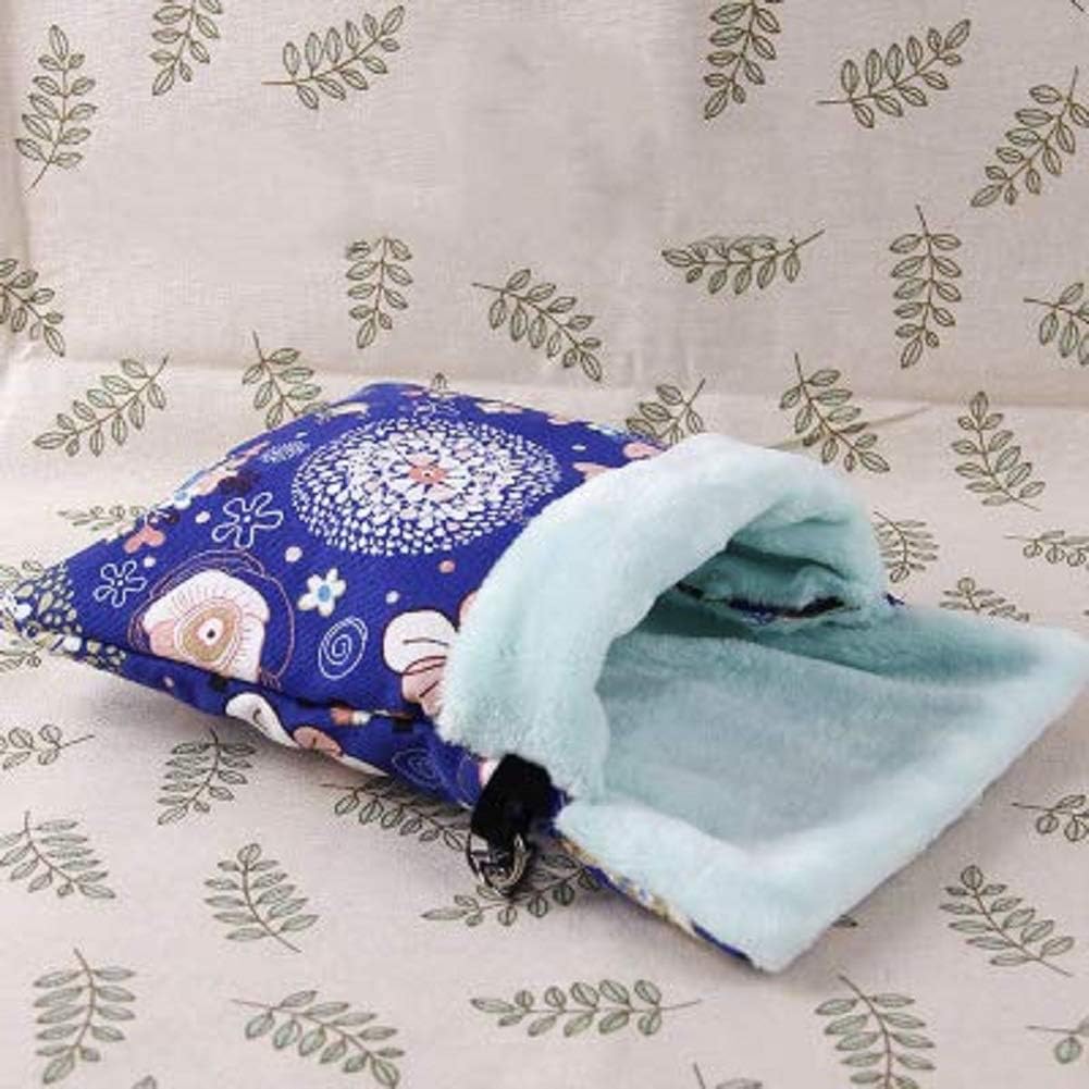 Folded fabric with blue and white pattern on a leaf-patterned background at Pet Servo