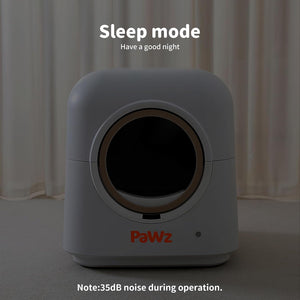A white cylindrical cat litter box with a circular opening, shown in a dim indoor setting with curtains in the background. White text at the top reads 'Sleep mode Have a good night' and text at the bottom says 'Note:35dB noise during operation at Pet Servo