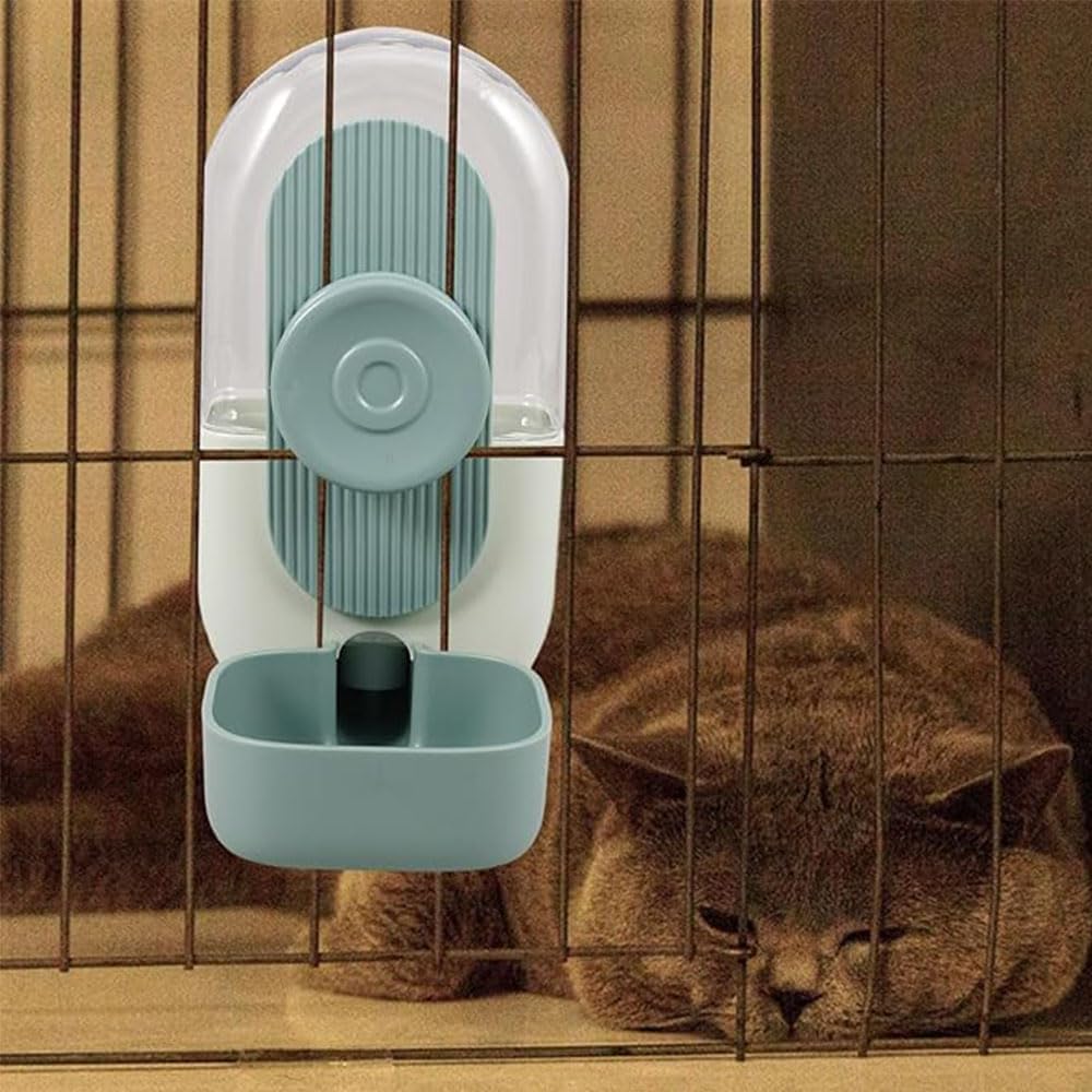 Cat drinking from a blue and white pet water fountain inside a cage at Pet Servo