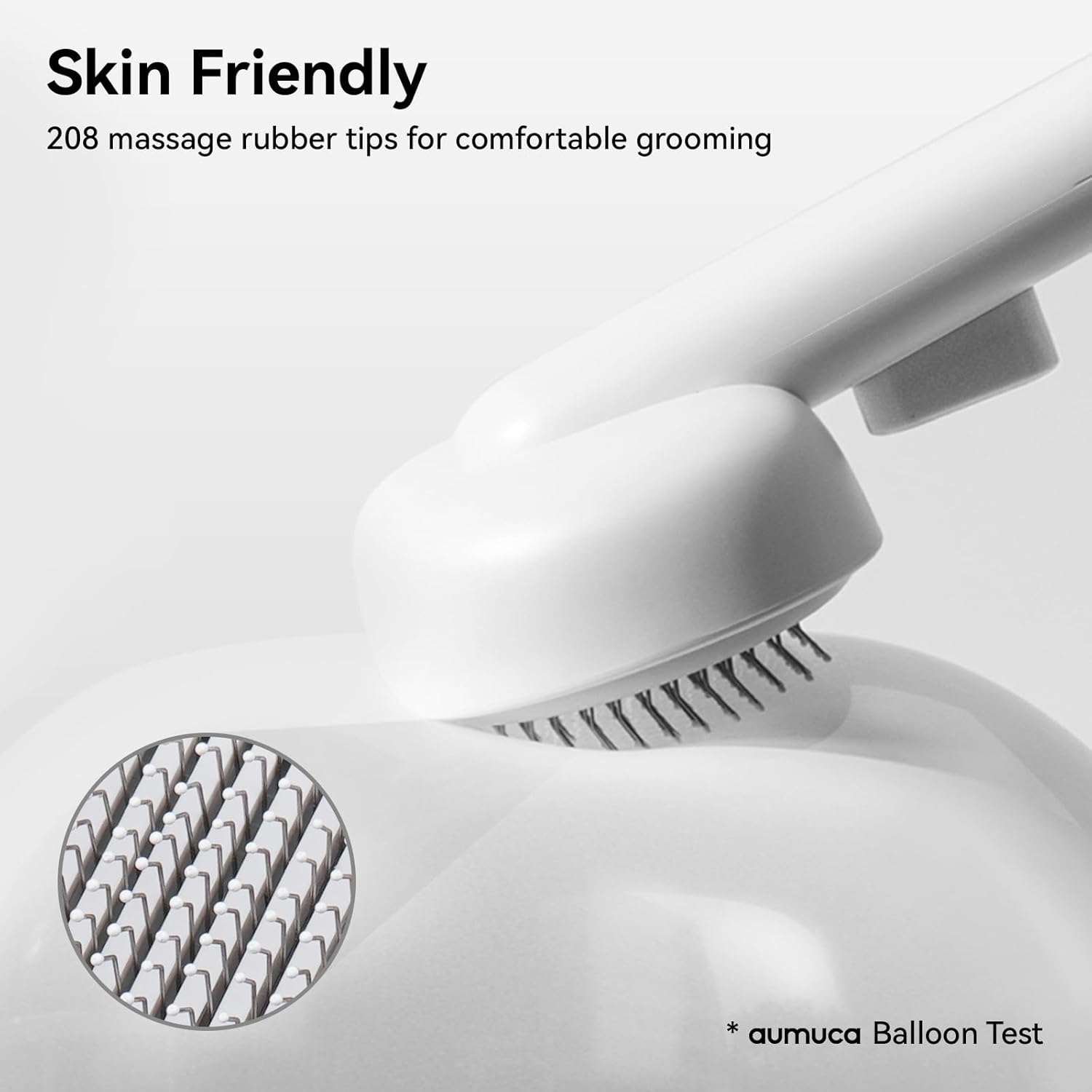 White grooming tool with massage rubber tips on a light gray background at Pet Servo
