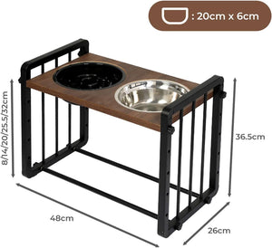 A raised pet feeder and waterer stand with a black metal frame, a dark wood-look top, and two bowls, shown with dimension labels on a white background at Pet Servo