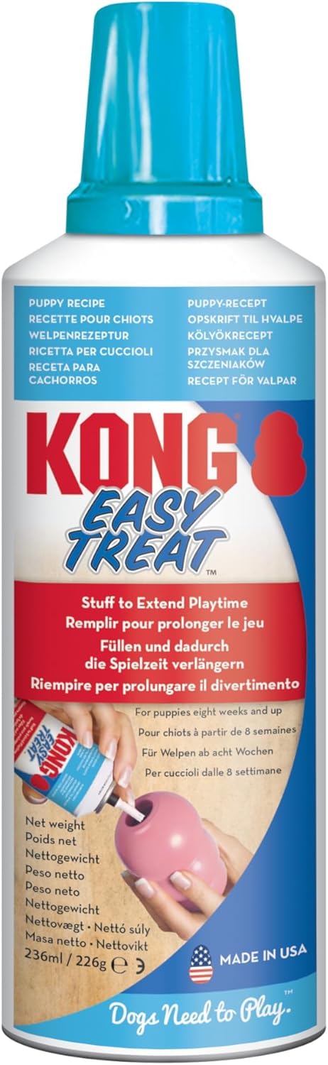A bottle of KONG Easy Treat joint supplement for dogs, featuring a white bottle with a blue cap and a red and blue label, containing pink joint supplement powder at Pet Servo