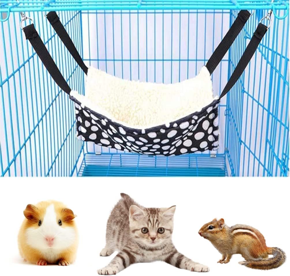 Pet hammock with black and white polka dots hanging inside a blue cage, with three pets below at Pet Servo