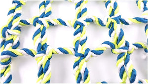 Close-up of blue, white, and yellow braided rope on a white background at Pet Servo
